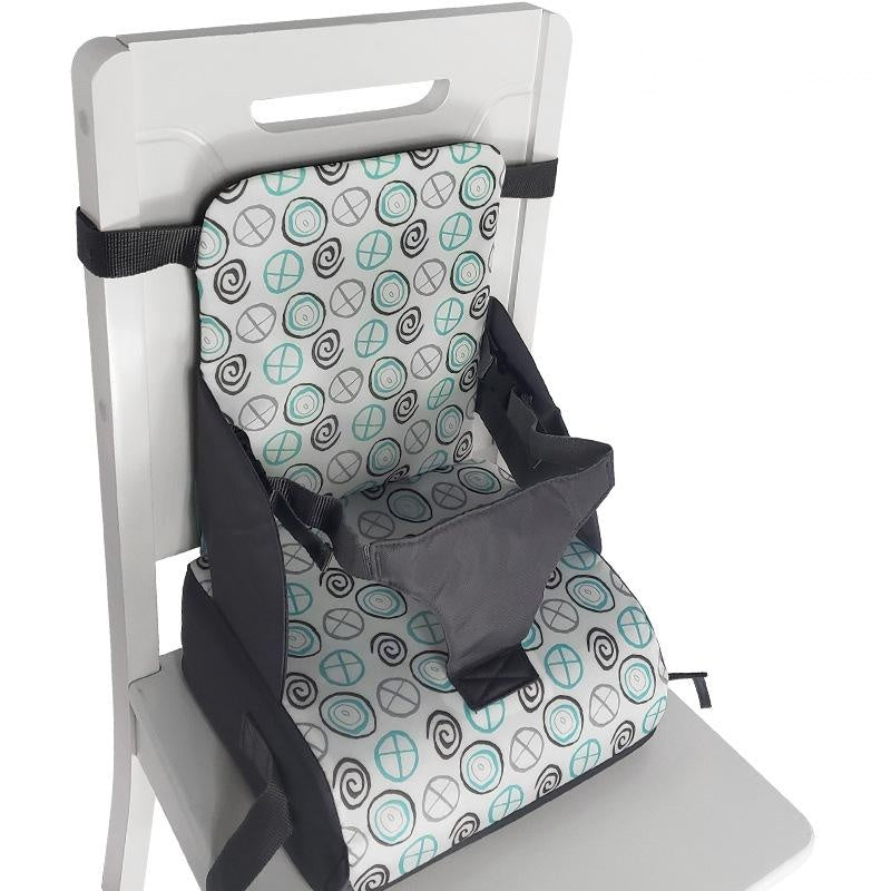 BleuRibbon Baby portable baby seat, lightweight, foldable, and secure for dining at home or travel.