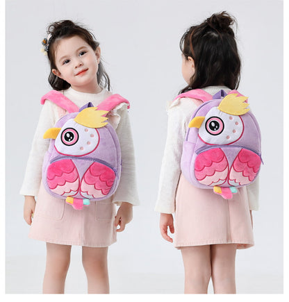 Child wearing a purple owl backpack with pink accents, shown from front and back views. bleu ribbon