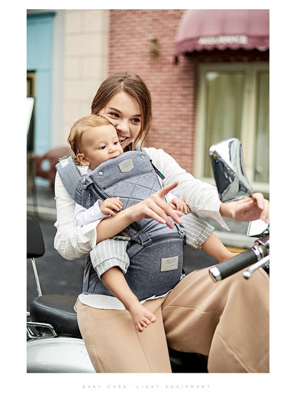 Woman riding a motorcycle with a baby in a carrier Easy-On Baby Carrier SwiftWear Ergonomic Infant Carrier for Dads Moms bleu ribbon