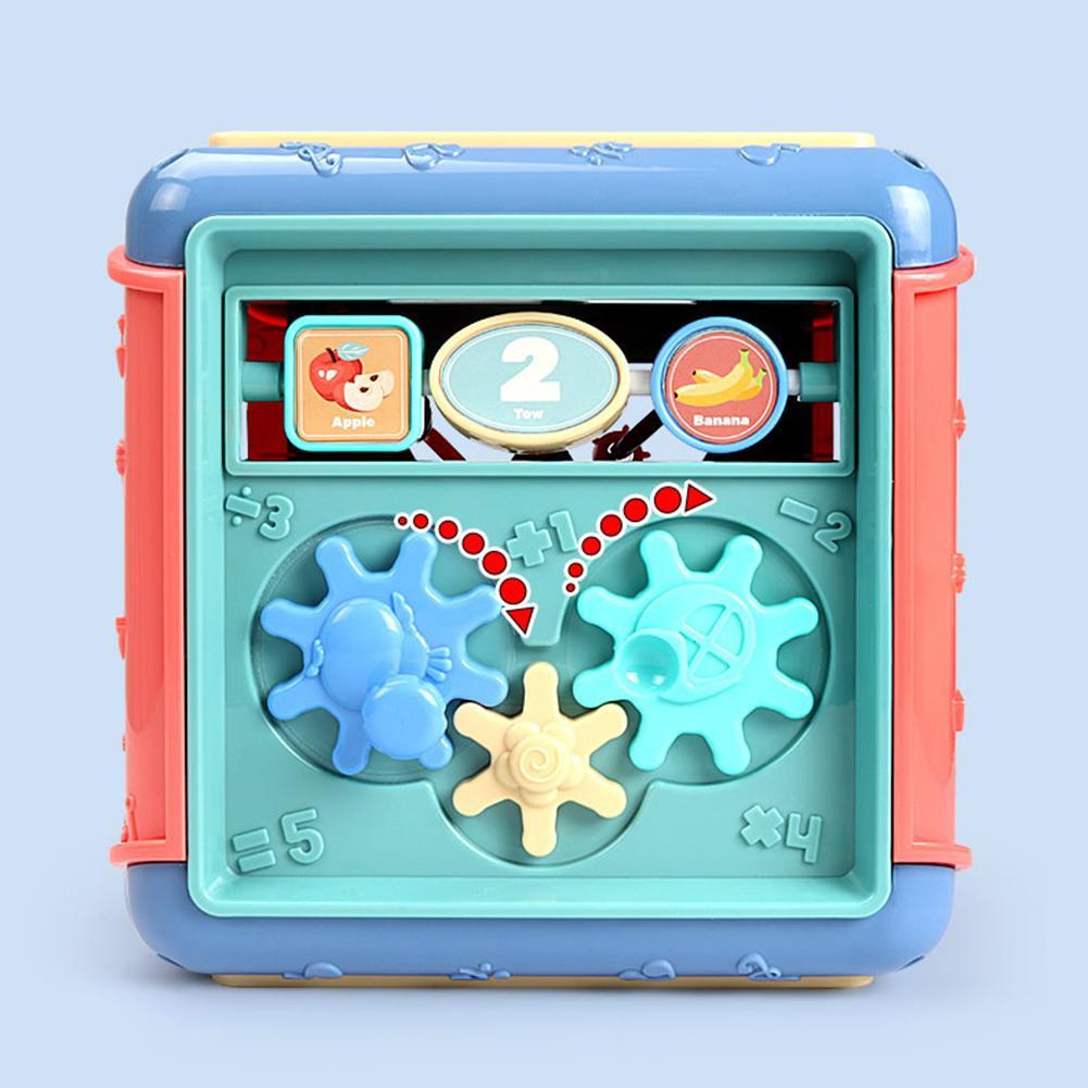 Educational toy with gears and numbers on a light blue background bleu ribbon