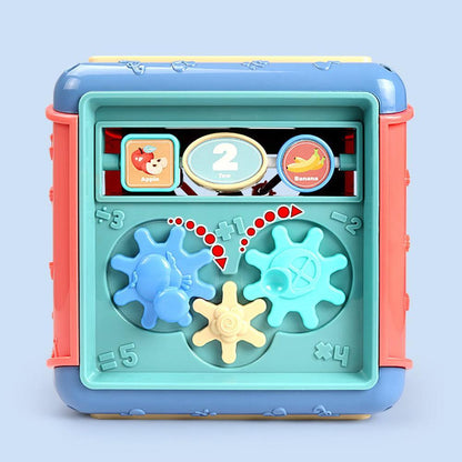 Educational toy with gears and numbers on a light blue background bleu ribbon