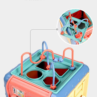 Colorful toy with geometric shapes and a close-up inset on a light gray background bleu ribbon