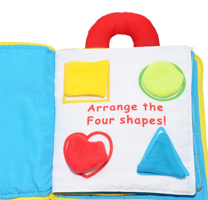 Children's shape sorting book with colorful shapes and text on a white background soft bleu ribbon baby