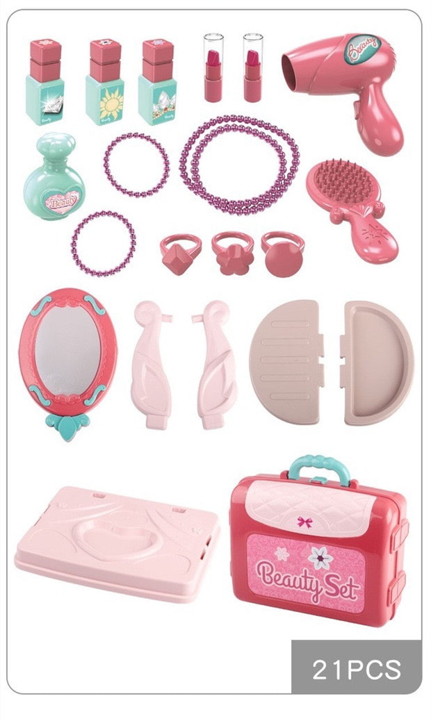 Collection of toy beauty items including a hair dryer, mirror, and various accessories on a white background. bleu ribbon baby