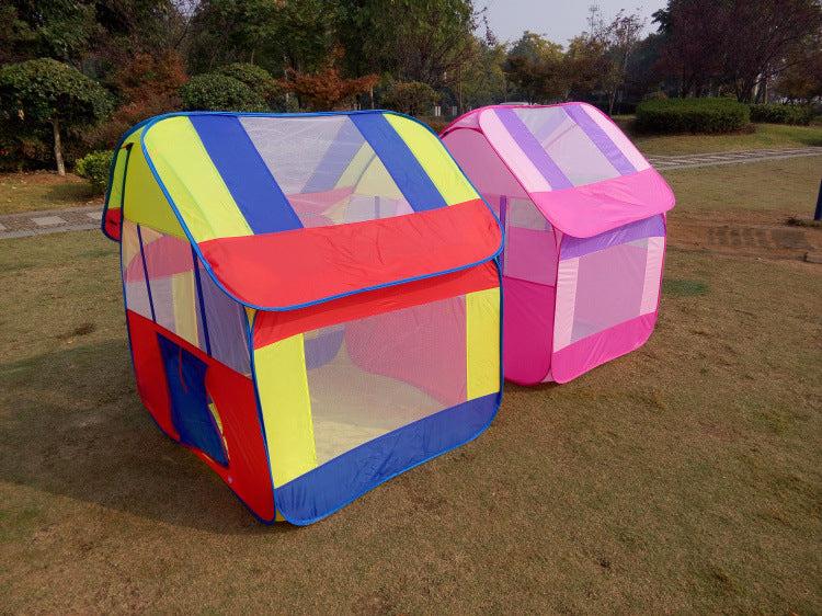 Two colorful children's play tents on grass with trees in the background bleu ribbon