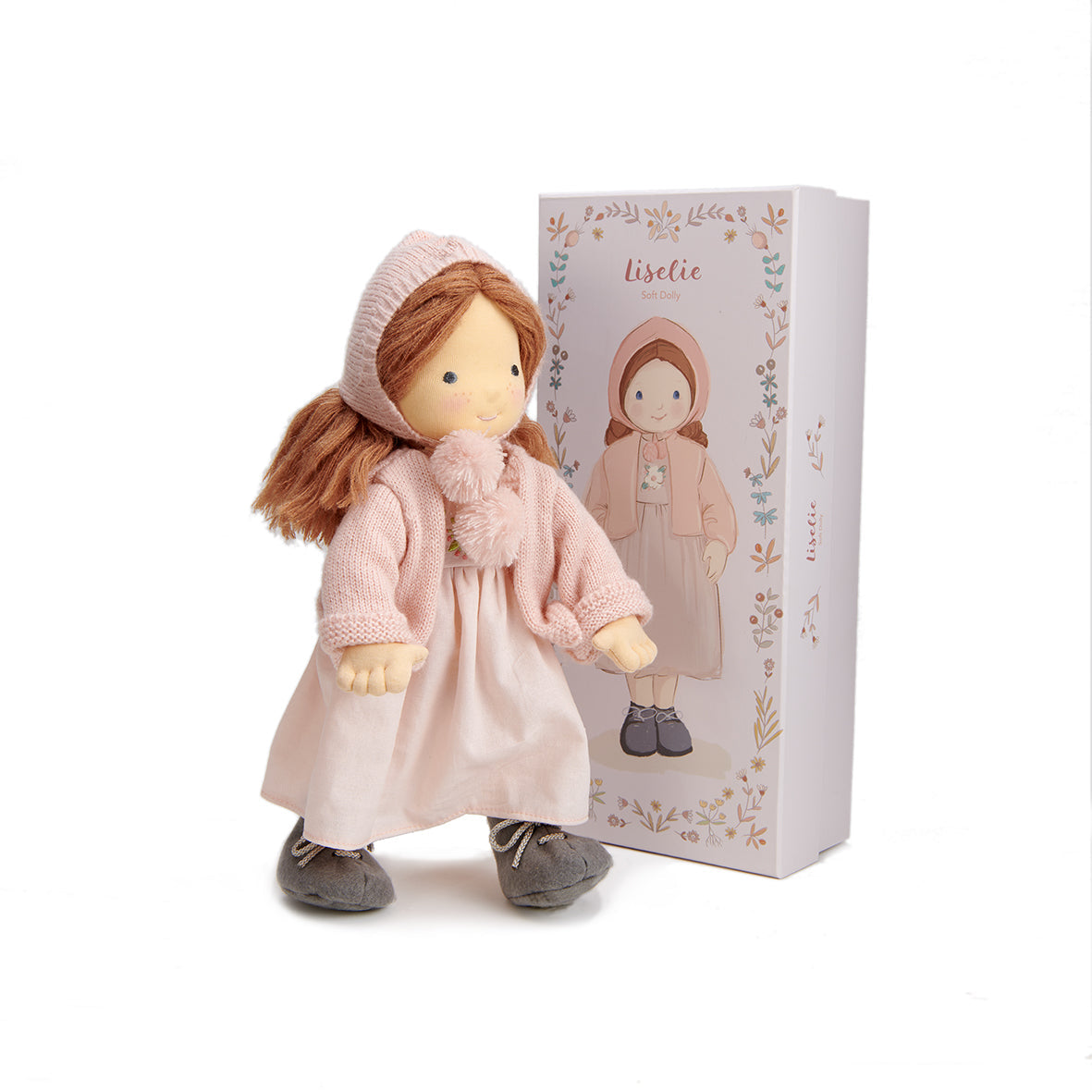 Doll in a pink outfit with matching box on a white background. Liselie Doll by ThreadBear Design - Waldorf-style textile ragdoll in gift box
