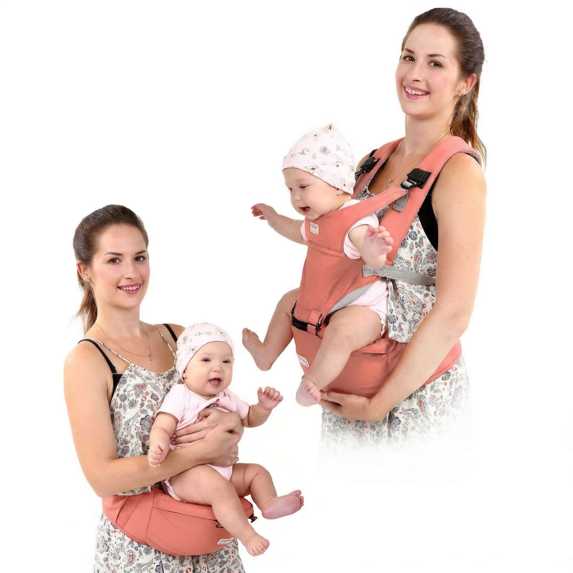 Two women wearing baby carriers with smiling babies on a white background