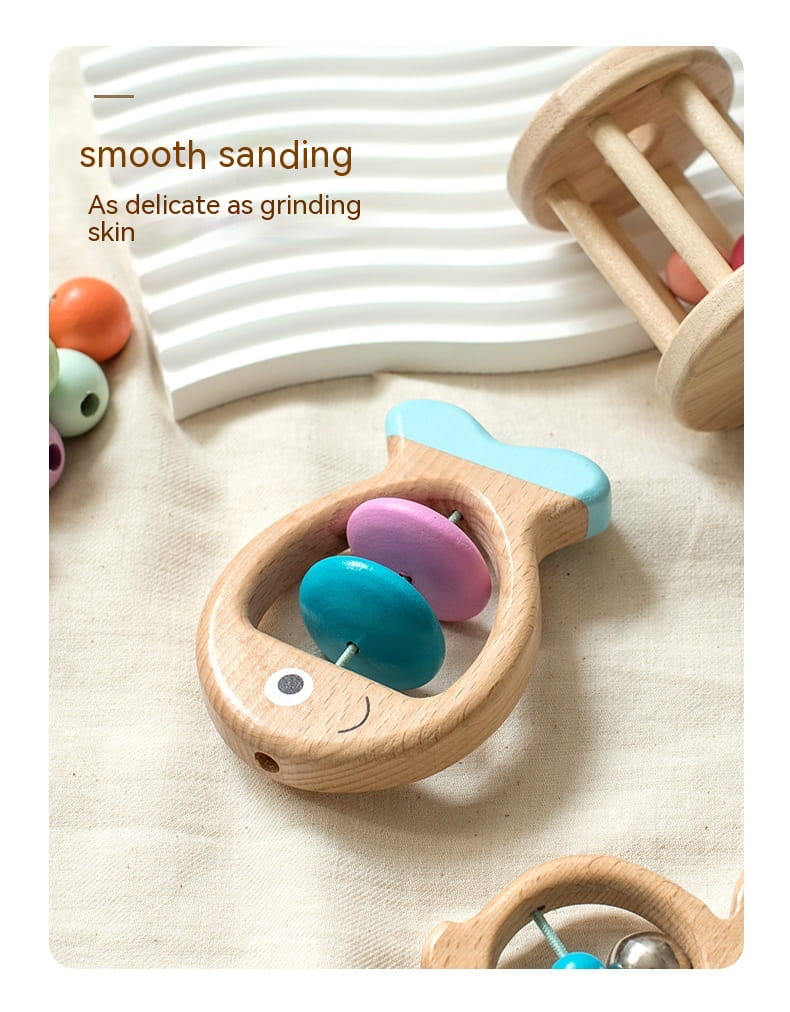 Wooden baby teether with colorful beads on a textured surface organic wooden set bleu ribbon baby
