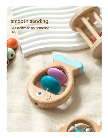 Wooden baby teether with colorful beads on a textured surface organic wooden set bleu ribbon baby
