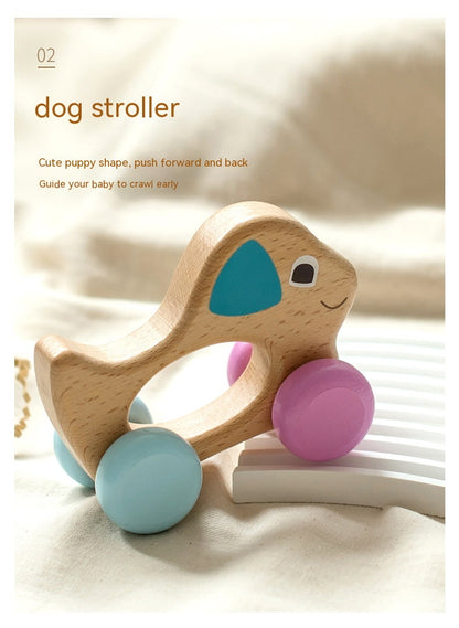 Wooden dog stroller toy with colorful wheels on a soft background. Montessori bleu ribbon baby