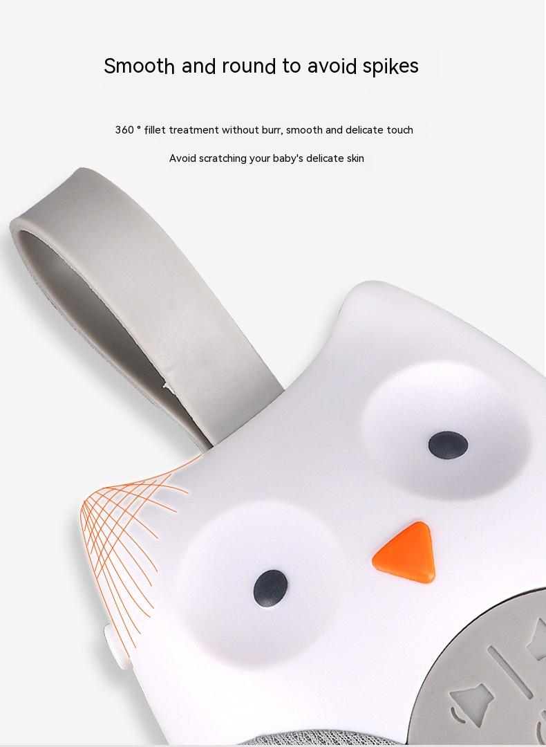 Baby teether with penguin design on a white background Owl Baby Crib Music Box Soothing Sleep Aid 
