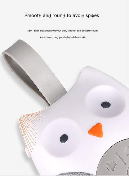 Baby teether with penguin design on a white background Owl Baby Crib Music Box Soothing Sleep Aid 