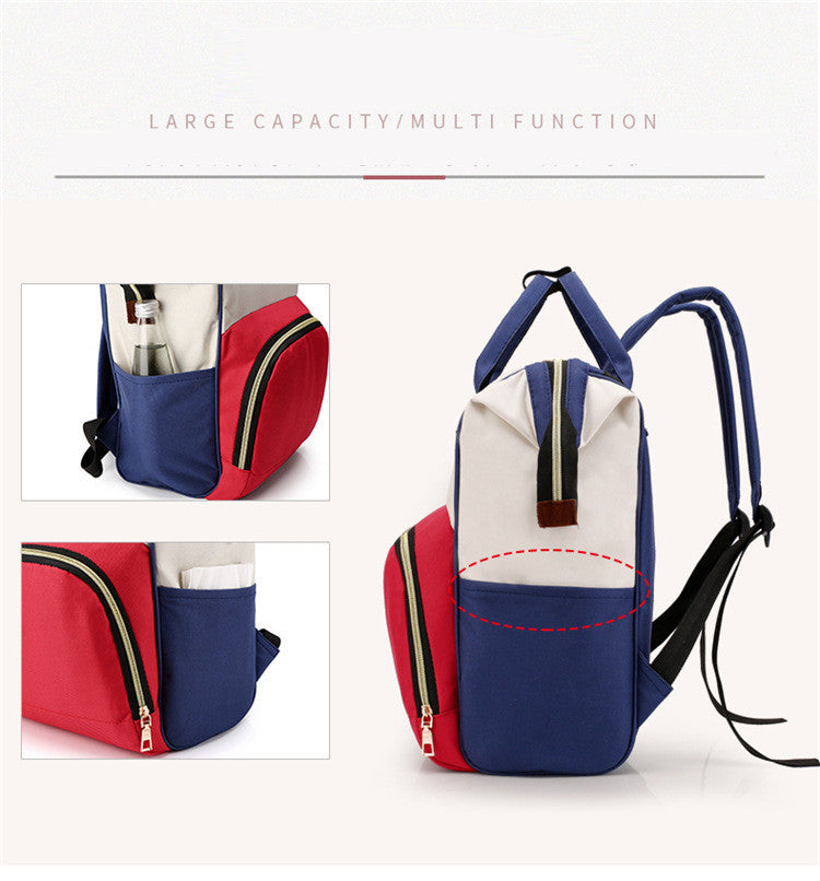 Red and blue backpack with multiple pockets on a white background bleu ribbon