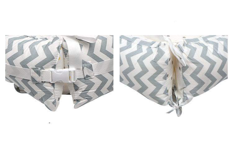 Two views of a baby crib bumper with gray and white chevron pattern and white bow. bleu ribbon baby