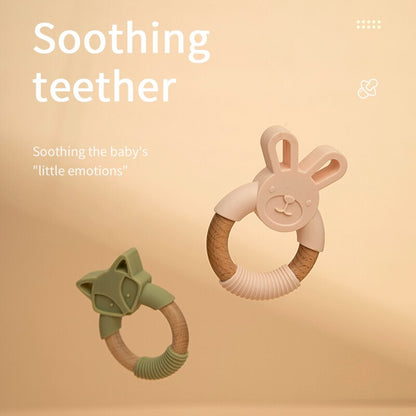 Two teething rings, one pink and one green, on a beige background with text about soothing a baby's 'little emotions'. bleu ribbon baby