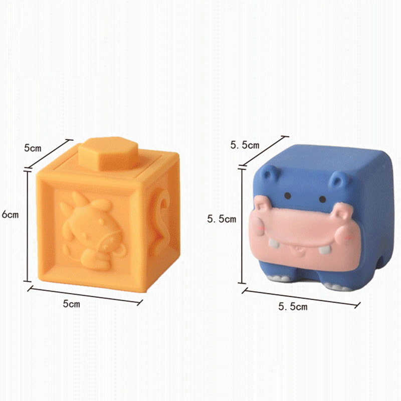 Two cube-shaped toys, one orange and one blue with a face design, shown with dimensions on a white background. bleu ribbon baby