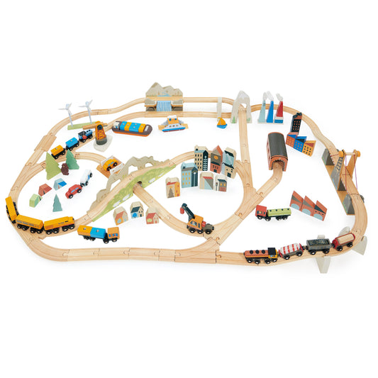 Wooden train set with tracks and miniature buildings on a white background Mountain View Wooden Train Set 58-piece set by Tender Leaf Toys
