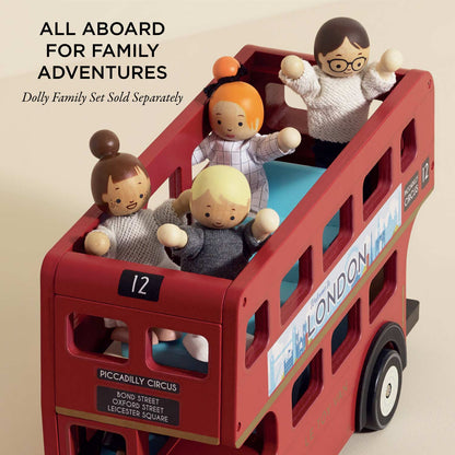London Wooden Bus by Le Toy Van with dolls inside on a beige background