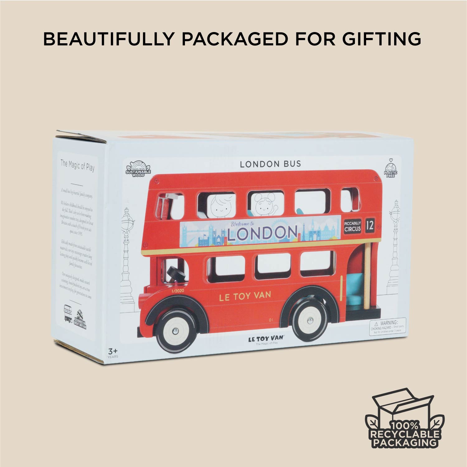 Boxed toy London Wooden Bus by Le Toy Van with branding and recycling information on a beige background.