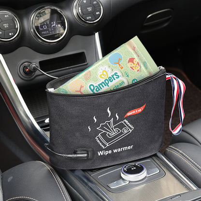 Pampers wipe warmer in a car cup holder with Pampers wipes inside. bleu ribbon baby