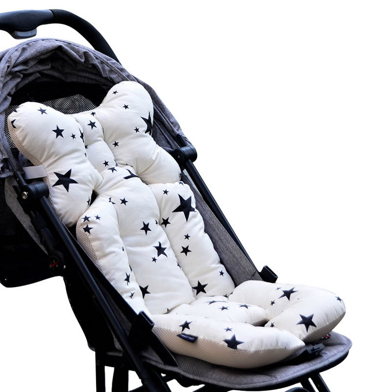 White baby seat cover with black star patterns on a stroller  bleu ribbon