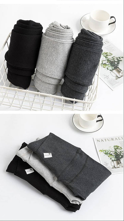 Folded black, gray, and white pants in a basket on a white surface. V-Waist Maternity Support Leggings Cotton Pregnancy Yoga Pants bleu ribbon