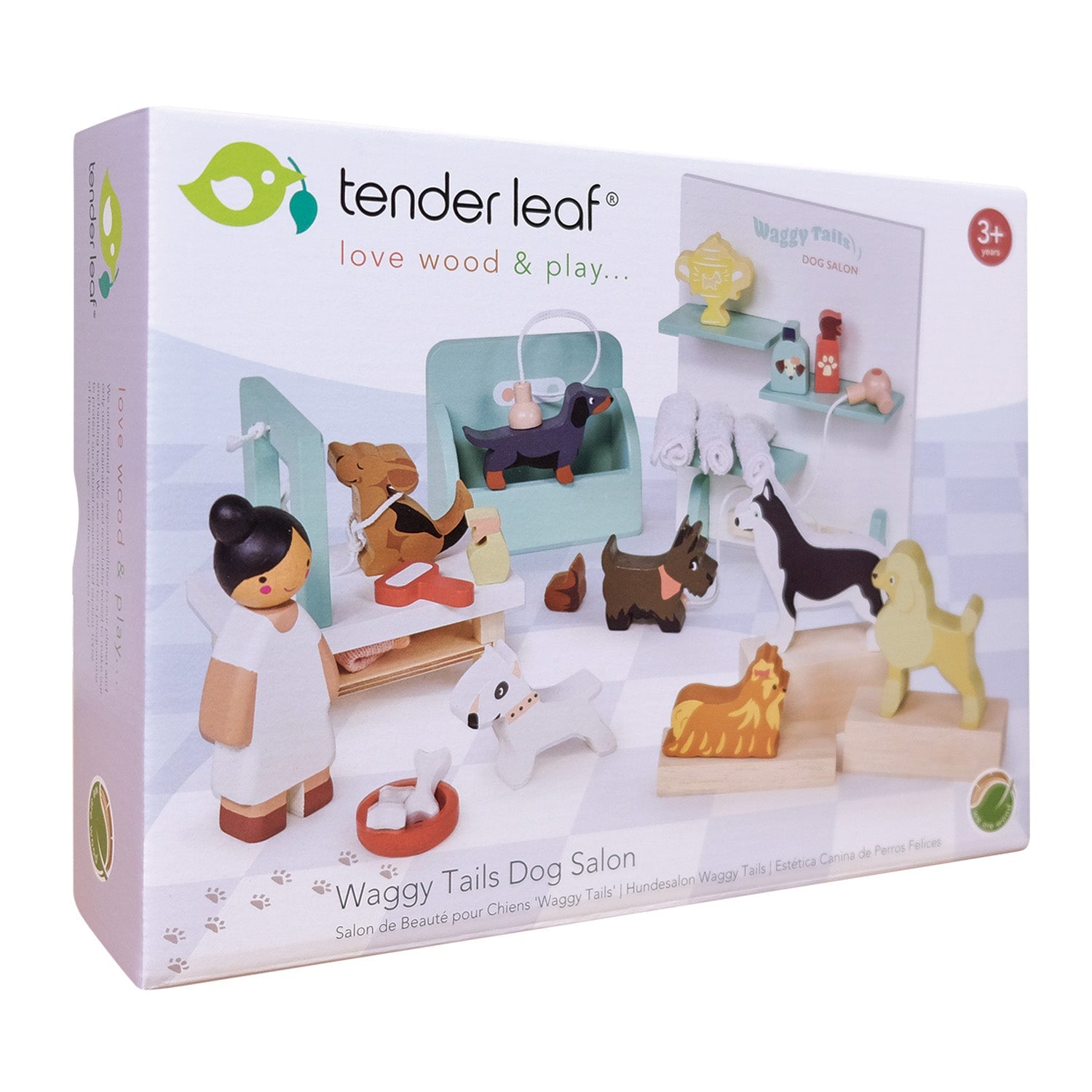 Tender Leaf Toys Waggy Tails Dog Salon packaging with wooden animal toys and a doctor figure. Waggy Tails Dog Salon by Tender Leaf Toys - Wooden dog grooming set with 7 breeds