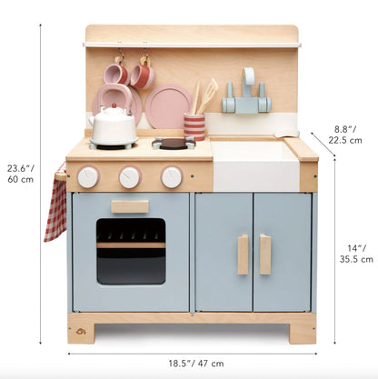 Wooden toy kitchen set with measurements on a white background. Detailed close-up of the integrated butler sink with functional-style double taps, showcasing the premium craftsmanship and non-toxic finish