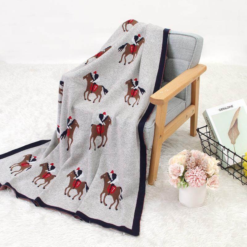 BleuRibbon Baby Soft Stroller Blanket – Cozy cotton blanket for babies, 31.5 in x 39.4 in, in gray and beige.