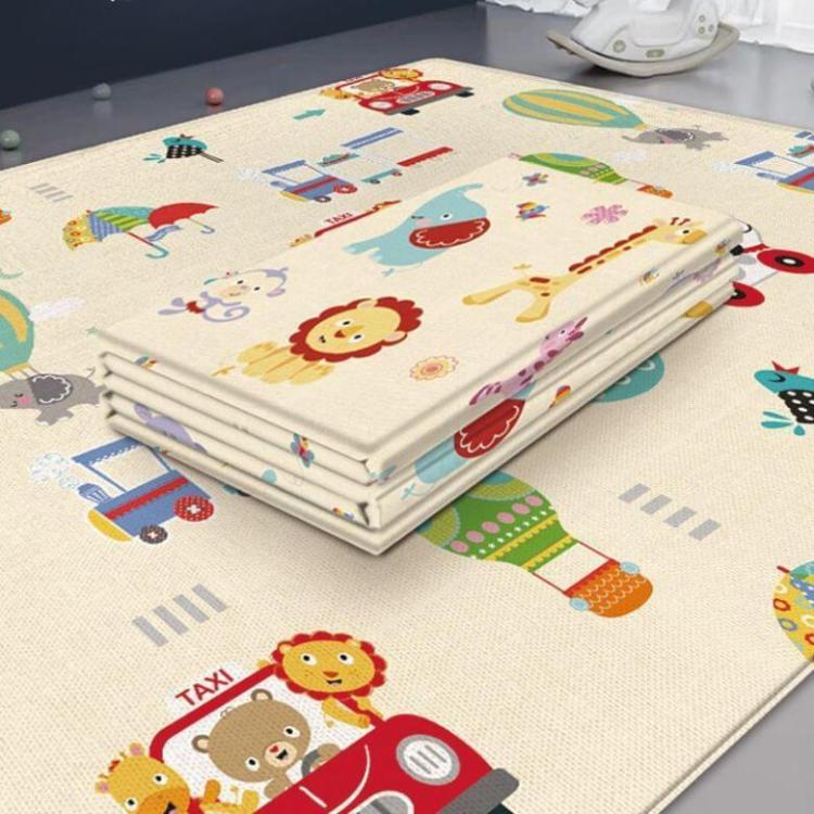 BleuRibbon Baby Crawling Mat with Lion King and Green World patterns, safe and eco-friendly for baby playtime.