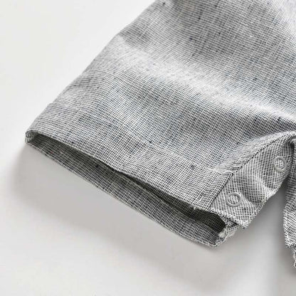 Folded gray fabric on a white background bleu ribbon baby