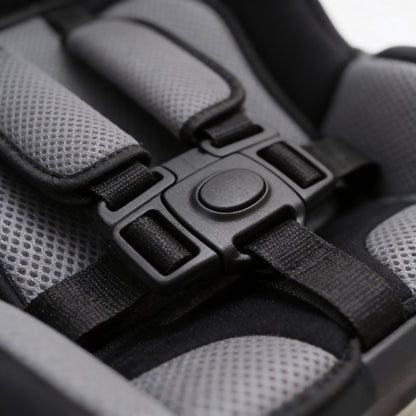 Close-up detail of BleuRibbon baby seat showing premium breathable grey mesh fabric and heavy-duty secure safety buckle. Durable and washable material for infants.