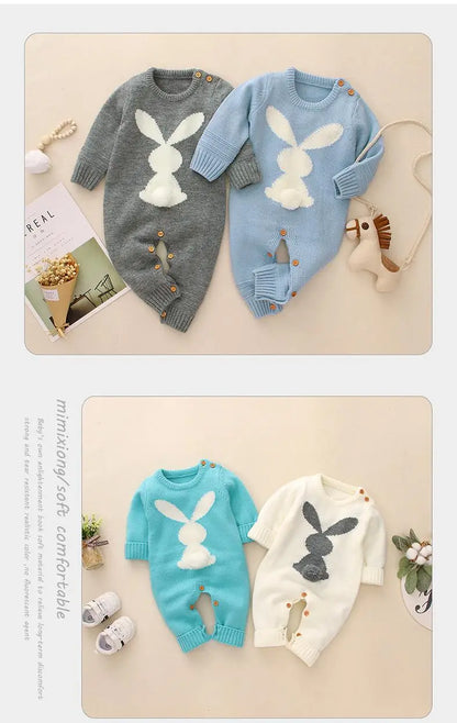 Two pairs of baby sweaters with bunny designs on a beige background. bleu ribbon baby