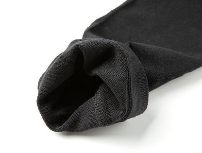 Close-up of a black sock on a white background bleu ribbon