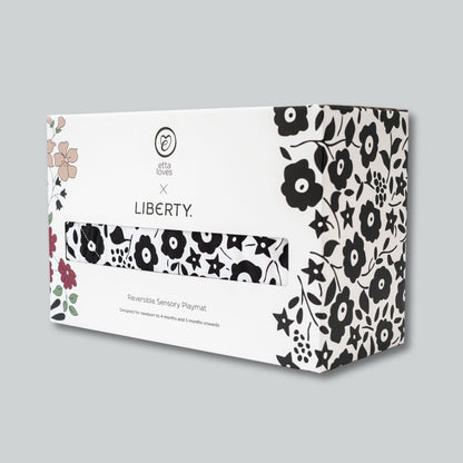 The premium, eco-friendly retail gift box for the Etta Loves x Liberty reversible sensory playmat, making it an ideal luxury baby shower gift.