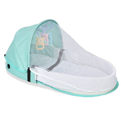 BleuRibbon Baby Folding Anti-Pressure Crib – Portable crib with linen fabric, mosquito net, and foldable design.