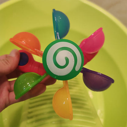 BleuRibbon Baby Rainbow Windmill Bath Toy for toddlers, colorful and safe water play toy for sensory development.