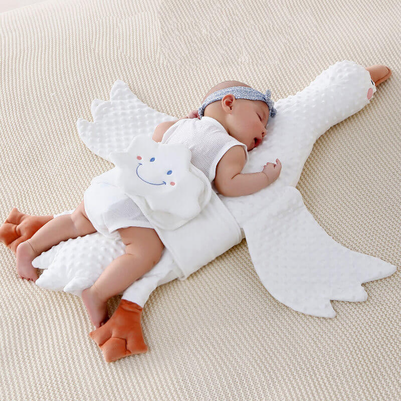 BleuRibbon Baby soft plush soothing pillow for infant comfort & sleep. Cozy, breathable, and machine washable.