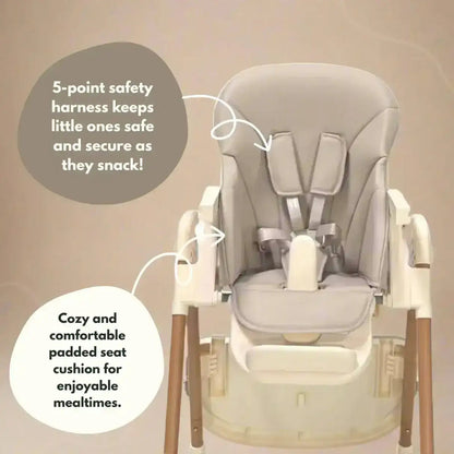 Venture Flare Highchair in Beige with adjustable height and wooden accents with safety harness and cushion on a beige background